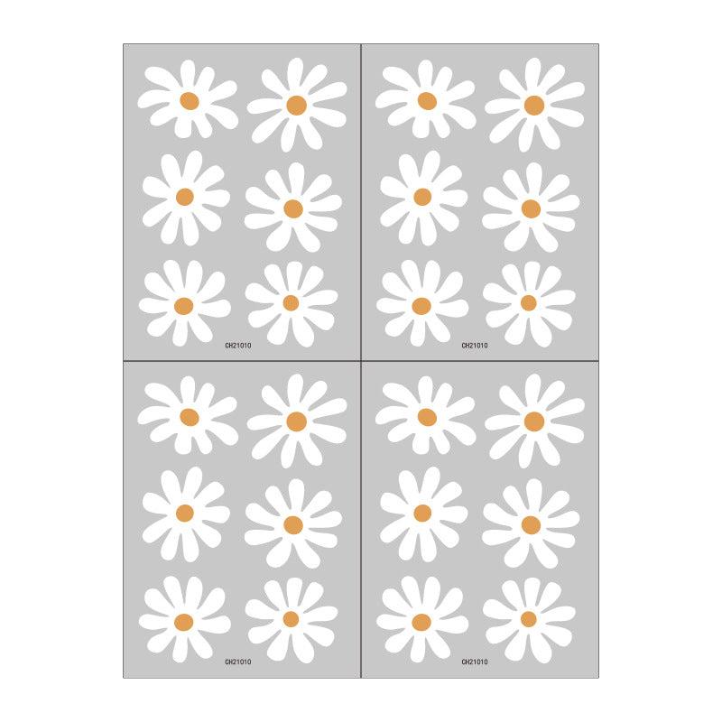 Vibrant daisy wall stickers being applied