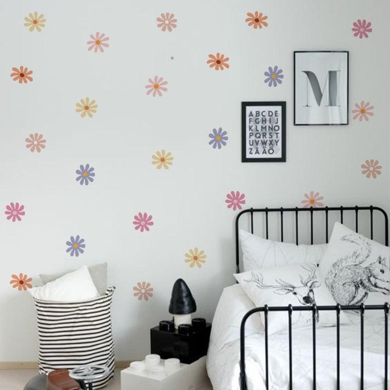 Removable daisy wall stickers displayed in a playroom