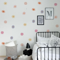Removable daisy wall stickers displayed in a playroom