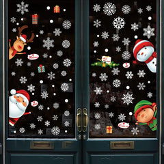 Festive winter window decals showcasing joy