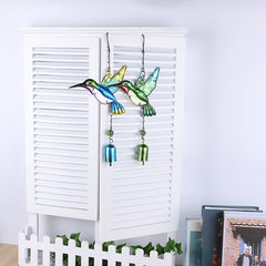 Vibrant metal and glass wind chime close-up view