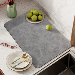Easy to clean coffee mat shown in washing machine