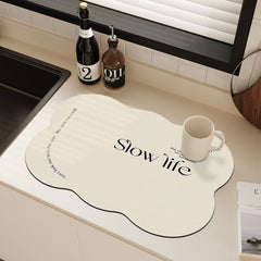 Heart-shaped water-drain mat on countertop