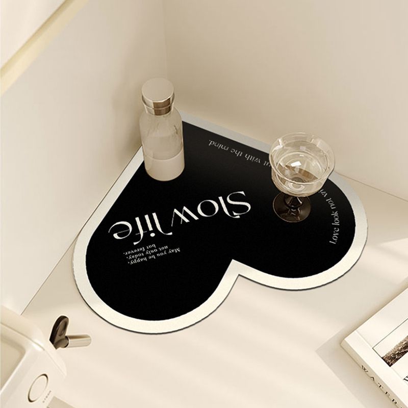Cream coloured kitchen water-drain mat