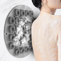 Lightweight back scrubber on a wall
