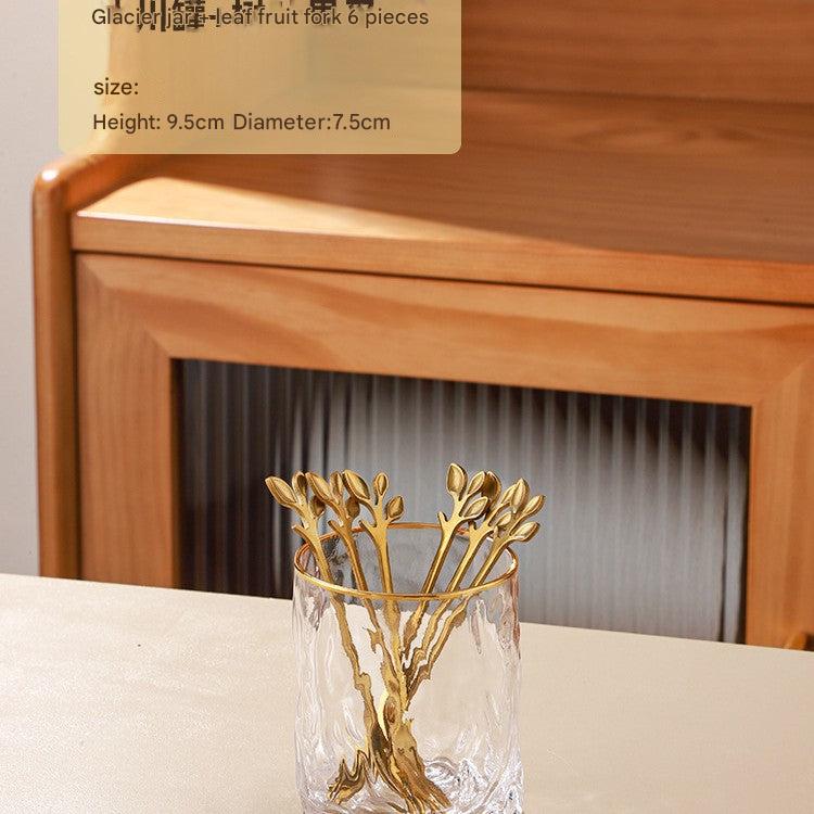 Stylish fruit fork stand on a dining table