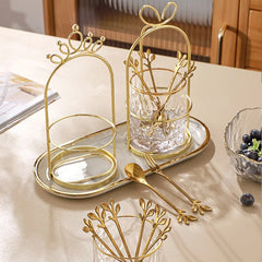 Close-up view of a gold stainless steel fork stand
