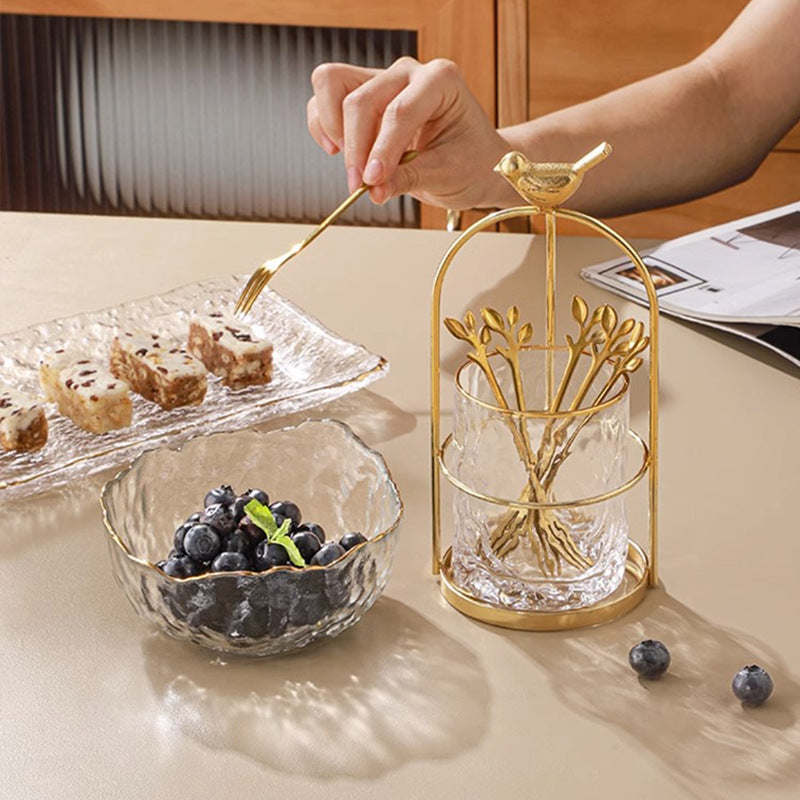 Stylish fruit fork stand on a dining table