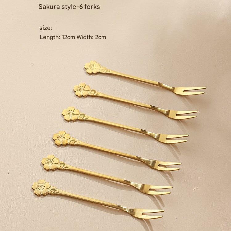 Gorgeous stainless steel fruit fork stand from above