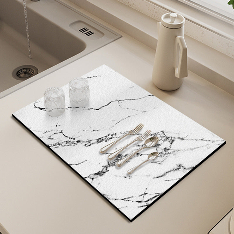 Water absorbent mat displaying its non-slip backing