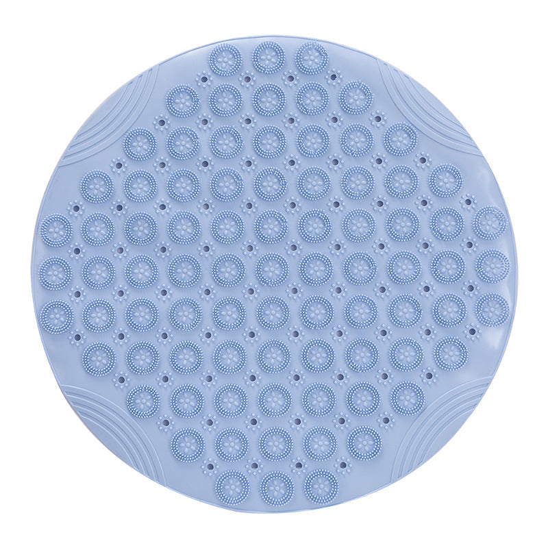 Silicone foot massage mat on flat surface