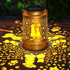 Hummingbird lantern in garden light
