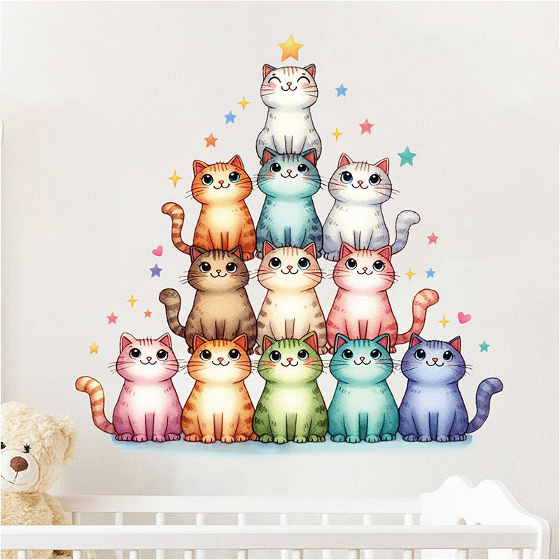 Removable kitty wall decals on a nursery wall