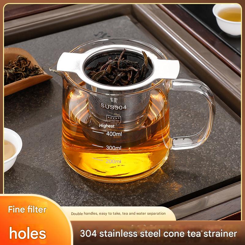 dual handle tea strainer in use image 2
