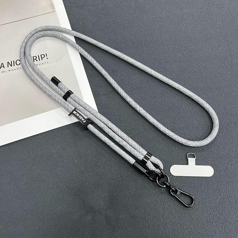 Close up of phone attached to adjustable lanyard