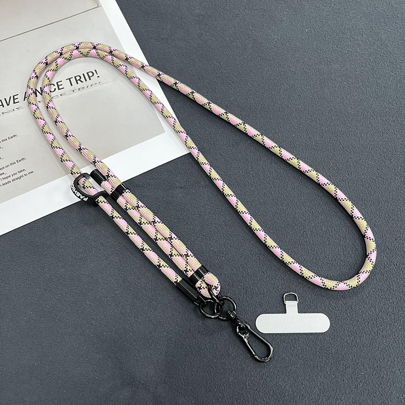 Mobile phone lanyard in a fashionable setting