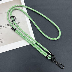 Close up of phone attached to adjustable lanyard
