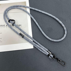 Different colours of mobile phone lanyards displayed