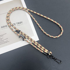 Close up of phone attached to adjustable lanyard