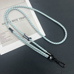 Different colours of mobile phone lanyards displayed