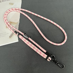 Universal fit phone lanyard with a smartphone