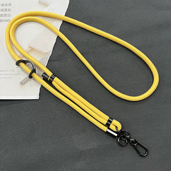 Mobile phone lanyard in a fashionable setting