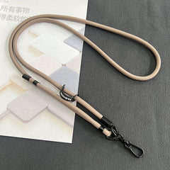 Different colours of mobile phone lanyards displayed