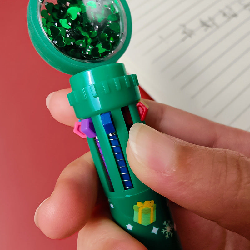 Retractable pens with festive designs on white background