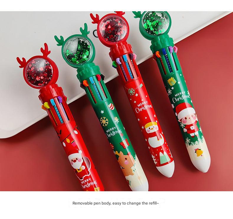 Group of colourful Christmas pens ready for writing