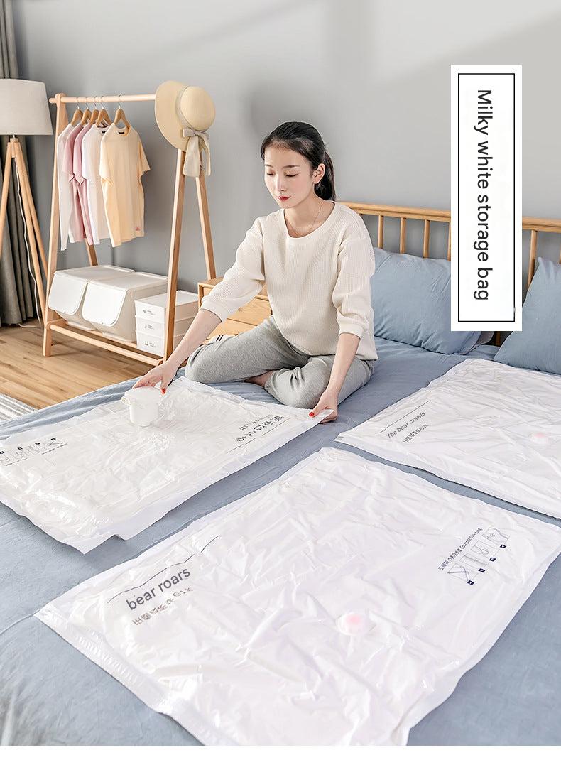 Vacuum storage bag with clothing in it